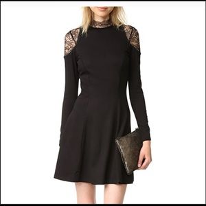 Alice & Olivia black dress with lace collar and shoulder